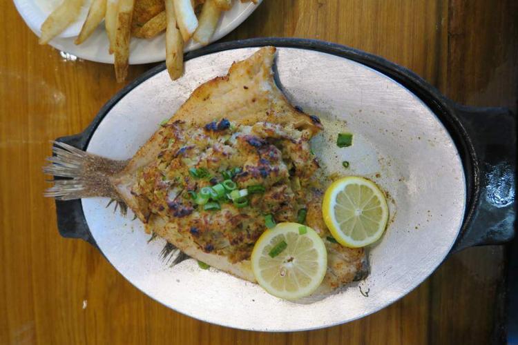 Following the flounder: why this New Orleans seafood classic enjoys a cult following, bones and all _lowres